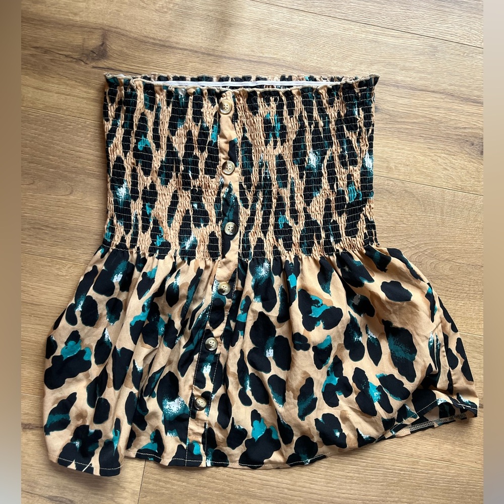 Peplum cinched tube top